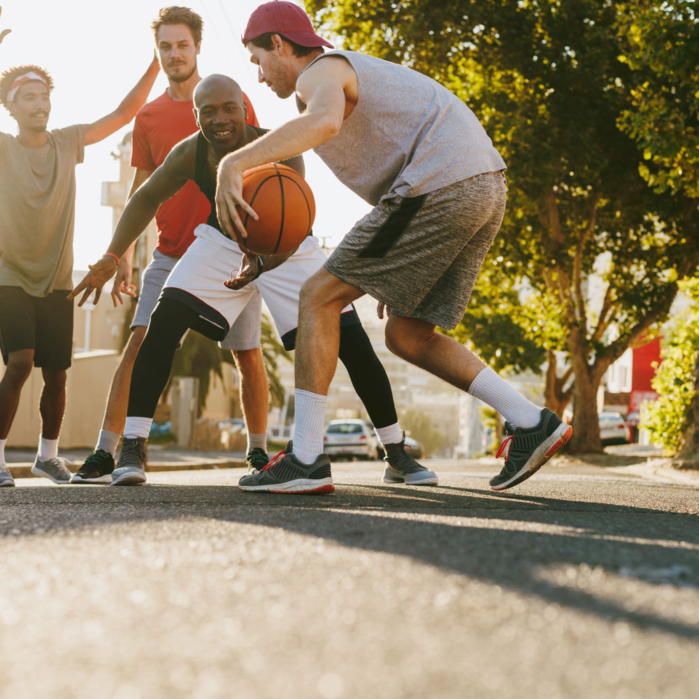 men playing basketball